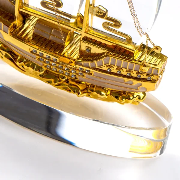 Golden Boat Shaped Memento in Metal with Glass Base in Luxury Box — product photo 1